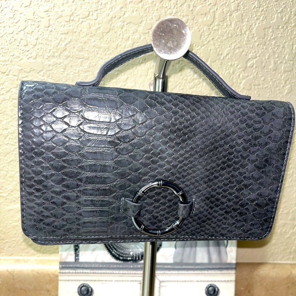 NWOT Lulu Dharma - Gray Bamboo Clutch
LULU DHARMA
